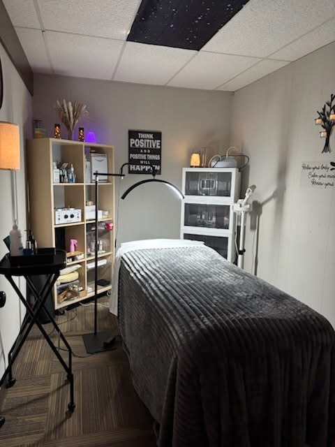 Cozy spa room with massage table
